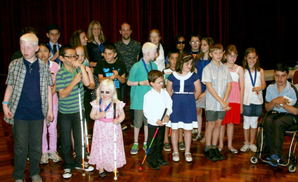 Author Nathan Luff with prize winners at the 2013 NSW Braille Writing Competition