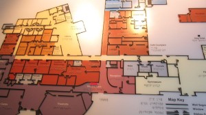 clear print tactile map with raised lines and braille labels depicting the interior of Visability building